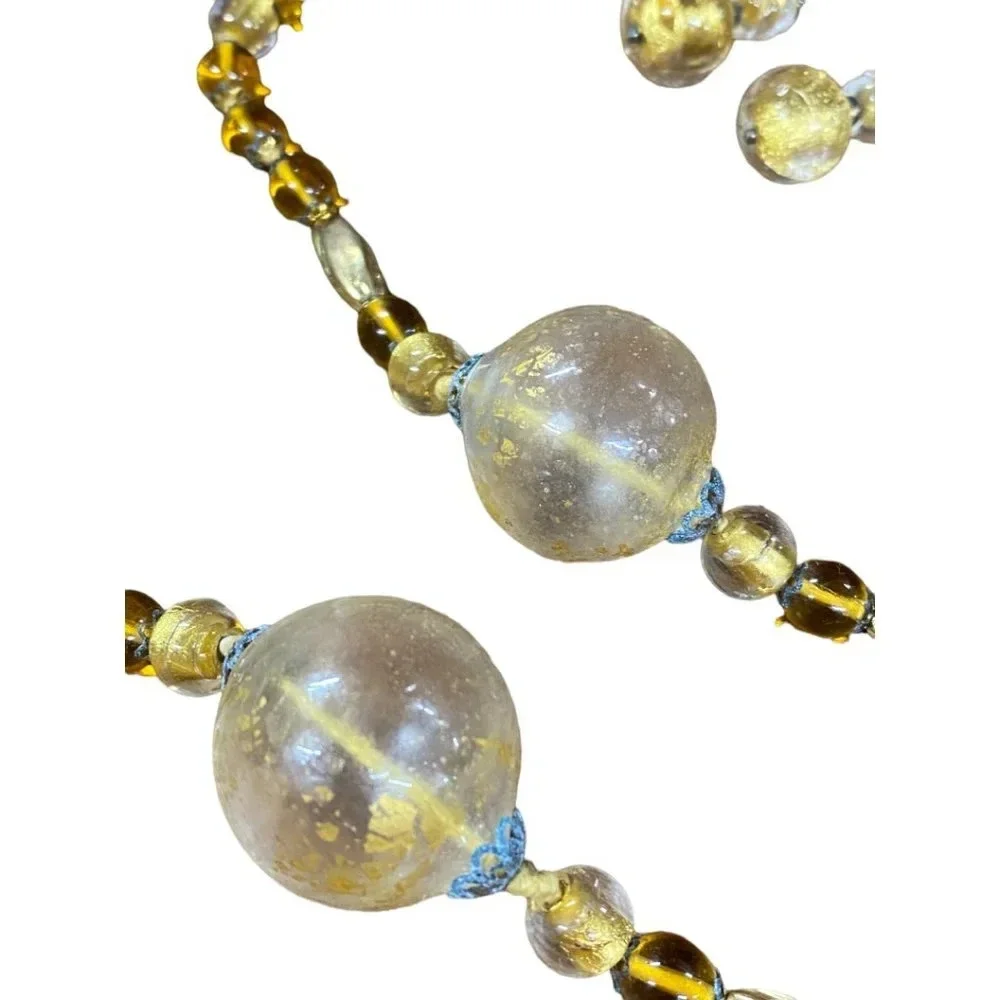 Gold tone beaded necklace‎